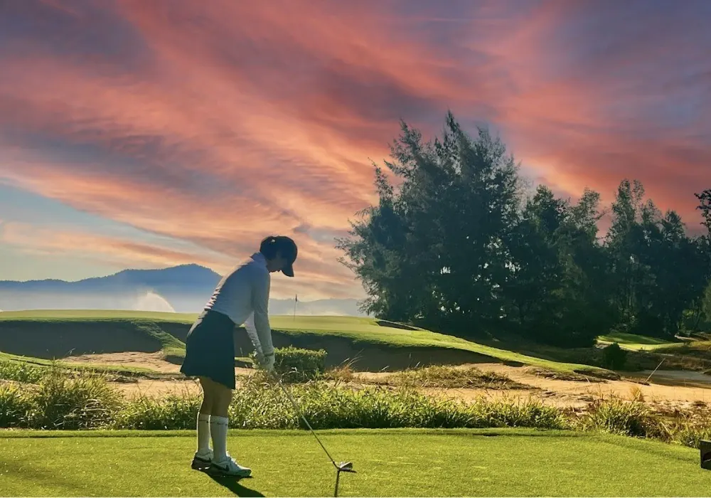 Green golf course at the Hue destination